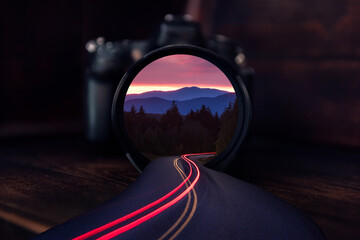 Scenic sunset, blue ridge mountains, reflection in camera lens