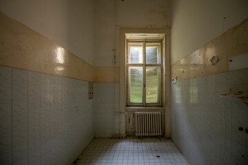 Old historic haunted orphanage in an abandoned palace in Hungary