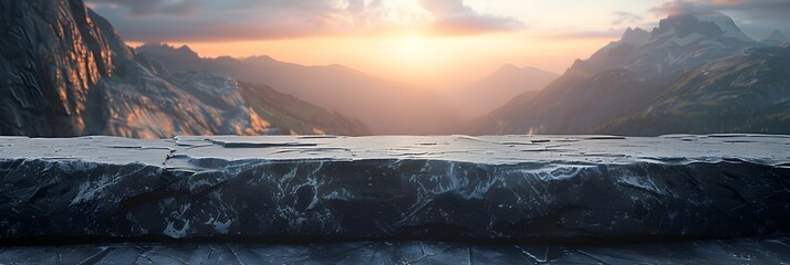 Empty black stone surface for product display montages with a mountain and sunset background