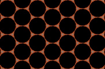 A big black dots pattern on an orange background