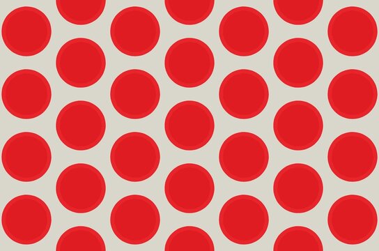 A big red polka dot pattern on a white background