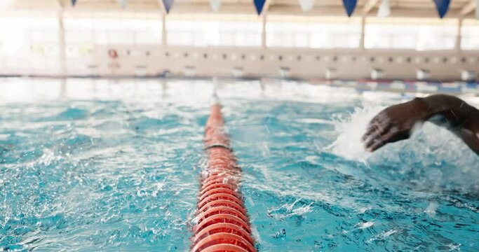 Pool, swimming and lane rope for training in water for fitness with exercise for workout. Athlete, stroke and divider for aquatic people with professional sport, reflection and racing in France