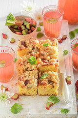Delicious and sweet rhubarb yeast cake as traditional summer cake.