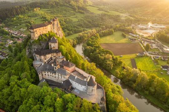 Medieval Oravsky Hrad castle at sunrise in Slovakia. Aerial view