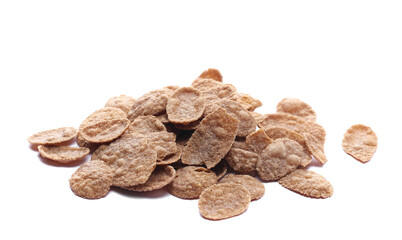 Branflakes pile, fiber flakes in wooden spoon isolated on white, side view