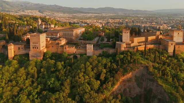 Aerial view of the Alhambra palace at sunset in Granada, Andalusia, Spain