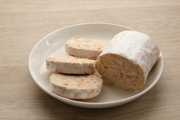 Raw Tempeh or Tempe, Indonesian traditional food, made from fermented soybeans.
