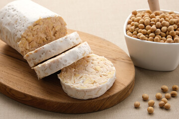 Raw Tempeh or Tempe, Indonesian traditional food, made from fermented soybeans. Usually fried for a side dish or for other cooking ingredients.
