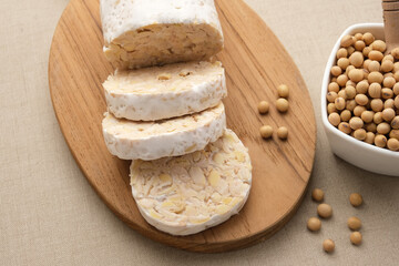Raw Tempeh or Tempe, Indonesian traditional food, made from fermented soybeans. Usually fried for a...