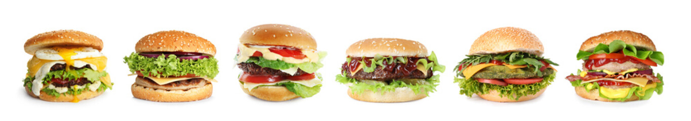 Different delicious burgers isolated on white, set