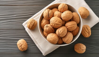 bowl of walnuts isolated on transparent background top view