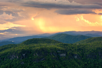 Scenic summer sunrise,passing storm at sunset, linville gorge, north carolina