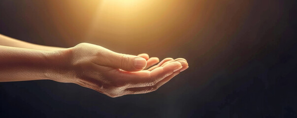 A hand is holding a hand with a lot of sand on it