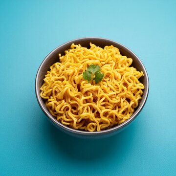 Plain Masala Maggi in bowl on blue background