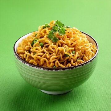 Plain Masala Maggi in bowl on green background