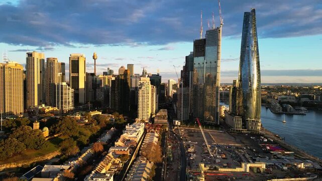 Sydney, Australia: Aerial drone footage of Sydney business district skyline and the modern Darling harbor at sunset