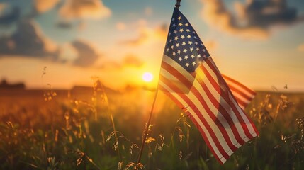 American flag flying behind them, warm evening light