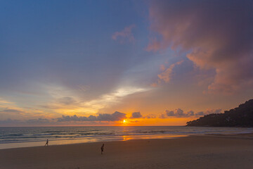 amazing sky at sunset..Scene of Colorful romantic sky sunset with cloud in sweet sky background..colorful clouds moving away rolling. .colorful clouds adorn the sky over the sea.