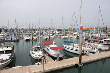 Fototapeta premium Big and small yachts anchored in the port 