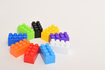 Colorful Plastic toy blocks isolated on white background. Building Blocks