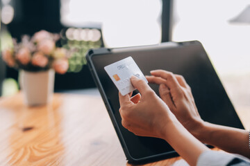 Happy asian woman using smartphone shopping online with credit card. Lifestyle. Easy pay using smart phone or digital device.