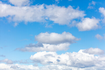 White clouds against a blue sky