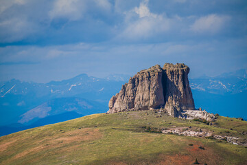 Geologic rock formation on tundra hill top