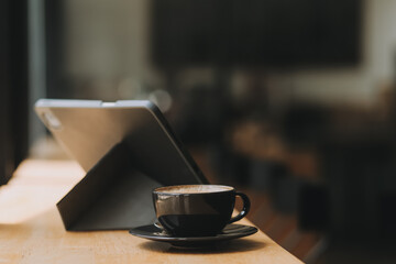 Coffee Cup on the Table with Computer Keyboard for Business Concept.