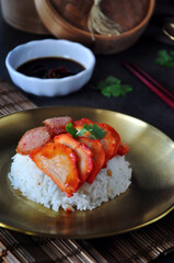Close up Chinese BBQ Pork with Rice on Gloden Dish