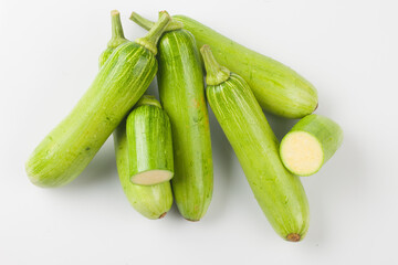  An annual vine of the gourd family. The vine has a pentagonal cross-section and grows by wrapping with tendrils.