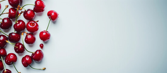 Fresh sweet red cherries on white blank plain background simplistic minimal edge banner crisp healthy summer fruit food rockabilly trendy health glossy mockup fresh farmers market shop ad campaign    