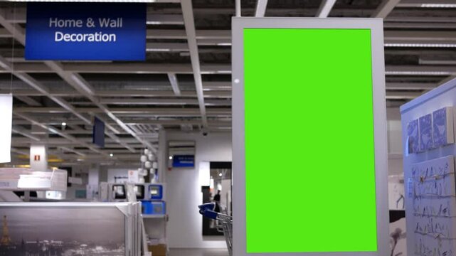 Motion of green screen billboard at home and wall decoration section inside an Ikea store with 4k resolution.