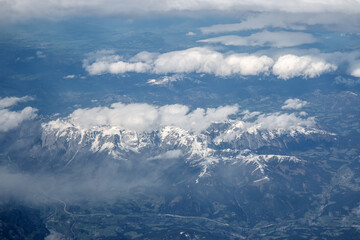 Fototapeta premium Cloud Formations and the alps near the Zugspitze from an Air Plane