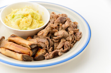 豚肉とエリンギのハーブソテーとキャベツのマスタード和え