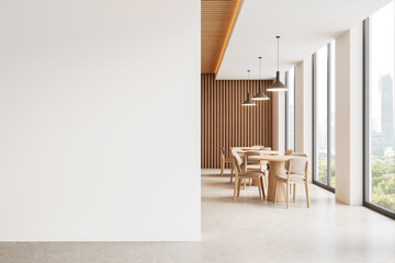 Stylish restaurant interior with chairs and tables in row, window. Mockup wall