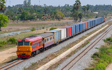 Obraz premium freight Container train num 777 at Phetchaburi, Thailand 