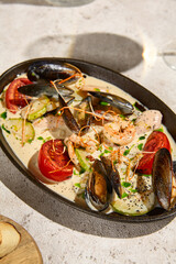 Creamy Seafood Sauté with Vegetables in Summer Sunlight