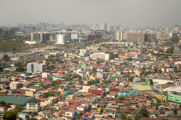 Obraz premium 飛行機から眺めるフィリピンマニラ首都圏の美しい風景Beautiful scenery of Metro Manila in the Philippines seen from an airplane