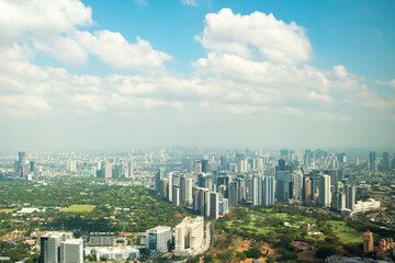 Naklejka premium 飛行機から眺めるフィリピンマニラ首都圏の美しい風景Beautiful scenery of Metro Manila in the Philippines seen from an airplane