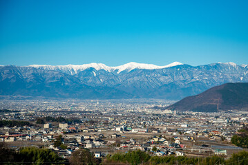 南アルプスを望む甲府盆地の絶景Spectacular views of the Kofu Basin overlooking the Southern Alps