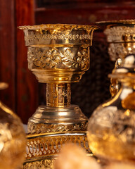 Ornate Golden Moroccan Teapots and Glasses With Dates on a Tray