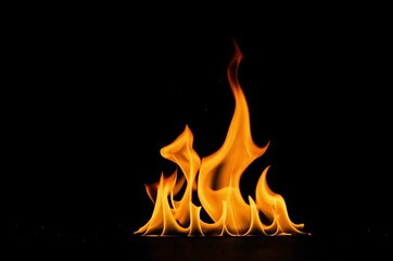 Fototapeta premium Orange fire flames at black background decorative illustration with copy space