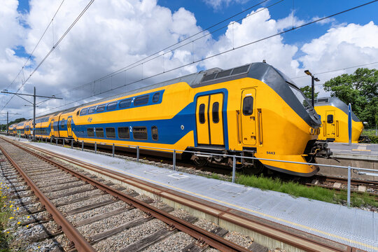 Enkhuizen, Netherlands -June 11, 2024: Nederlandse Spoorwegen VIRM trains at Enkhuizen railway station