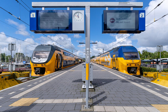 Enkhuizen, Netherlands -June 11, 2024: Nederlandse Spoorwegen VIRM trains at Enkhuizen railway station