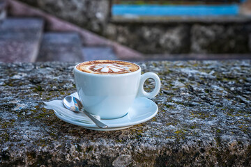 Hot mocha coffee. Cup of hot coffee with beautiful art. Morning Breakfast with coffee barista