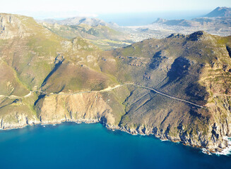 Aerial view, mountain and ocean in nature, outdoor and destination for vacation, explore and...