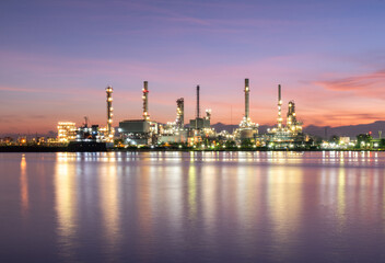 Obraz premium A crane on a large cargo ship docks loading a diesel-electric locomotive. Get off at Laem Chabang Port