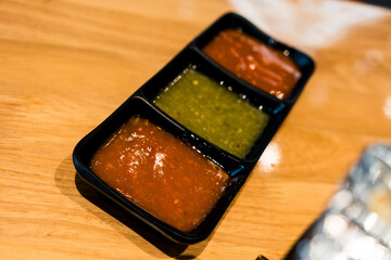 Shabu hot pot dipping sauce place on wood table