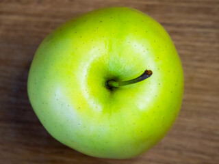 The apple looks ripe and ready to eat, emphasizing nutrition and wellness.