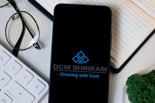New York, USA - 11 June 2024: DCM Shriram x Logo on Phone Screen, Company Icon